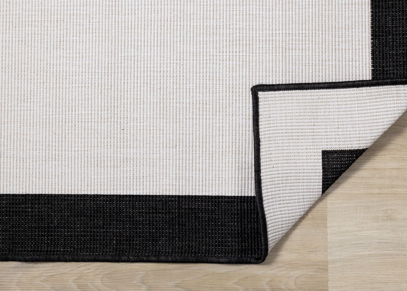 Summer Breeze 6'7" x 9'6" Reversible Outdoor Rug - Cream, Black Border