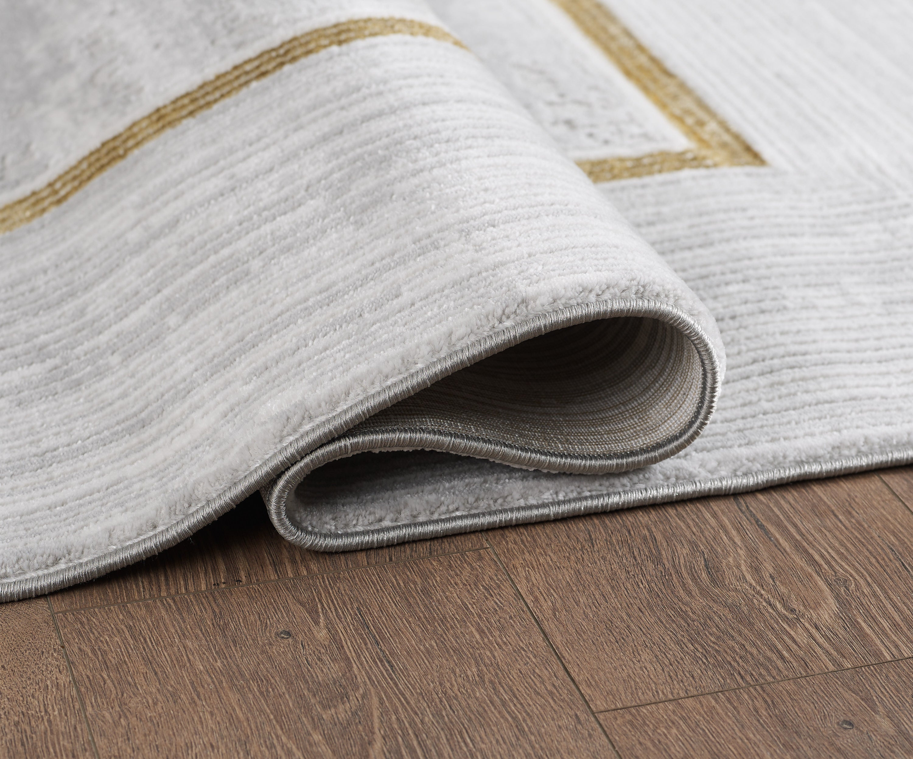 Merinos Lazer 6'6" x 9'5" Area Rug with Underpad - Light Grey