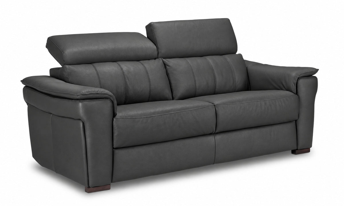 Angled view showing one adjustable headrest lowered on the Orlando-Ray leather sofa Leon's