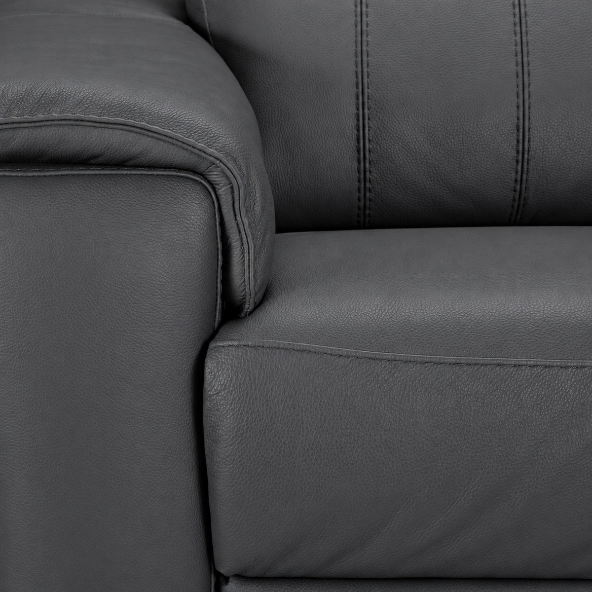 Close-up of the dark grey Italian leather upholstery, padded arm and detailed stitching