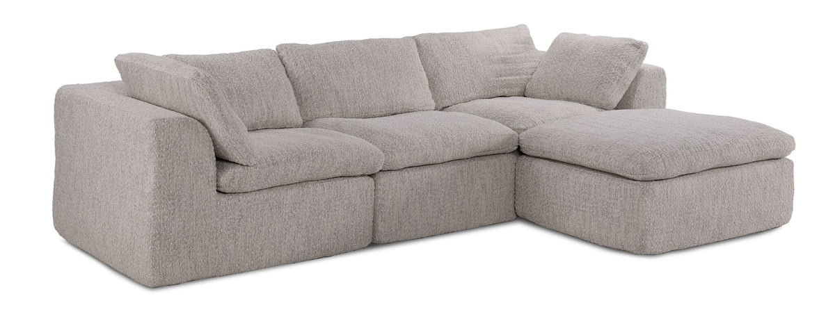 Bliss 3-piece modular beige sectional with right-facing chaise, plush cushions, wide arms and soft textured upholstery.