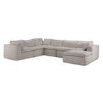 Beige Bliss 6-piece modular sectional with plush cushions, wide arms and extended chaise, shown from a three-quarter angle.