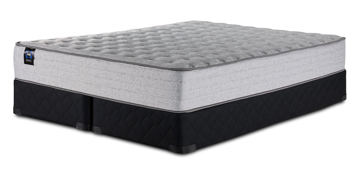 Sealy Burchelle Extra Firm Tight Top Queen mattress with split black boxspring set, three-quarter view