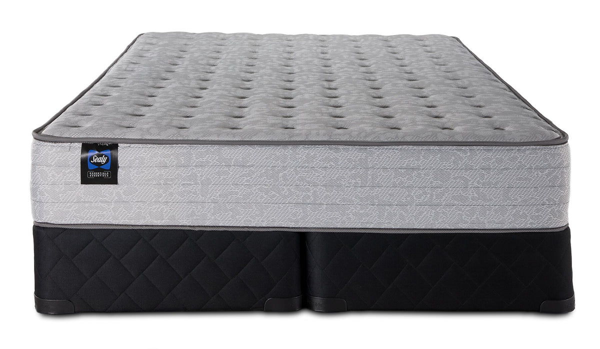 Sealy Burchelle Extra Firm Tight Top King mattress and black quilted split boxspring set, front view