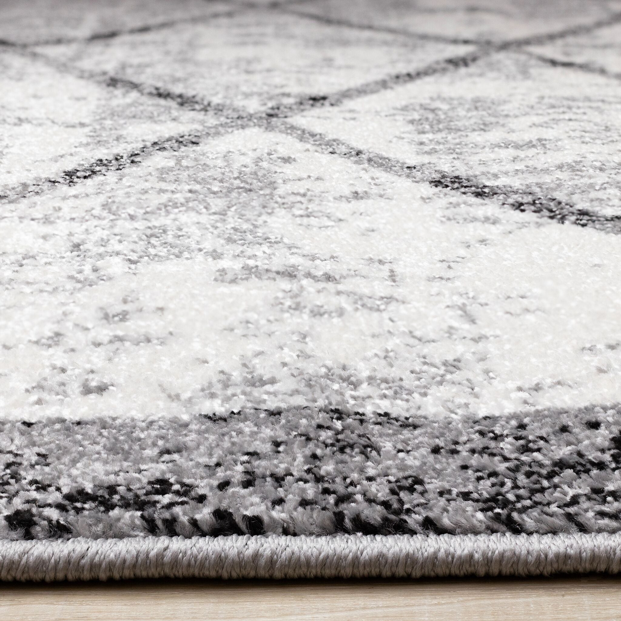 Ashwood 5'3" x 7'7" Distressed Lattice Area Rug - Grey, Black, White