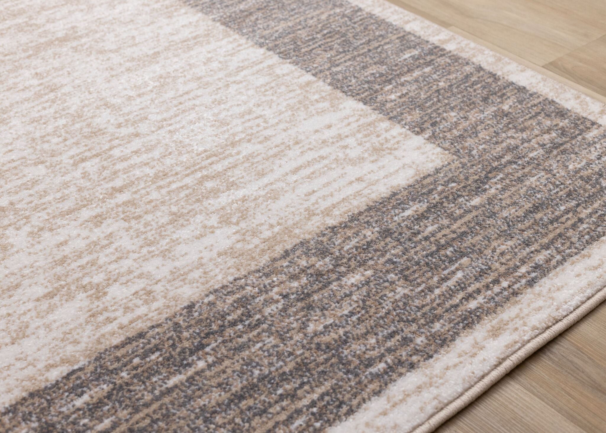 Earthly Essence 5'3" x 7'7" Distressed Border Area Rug - Taupe