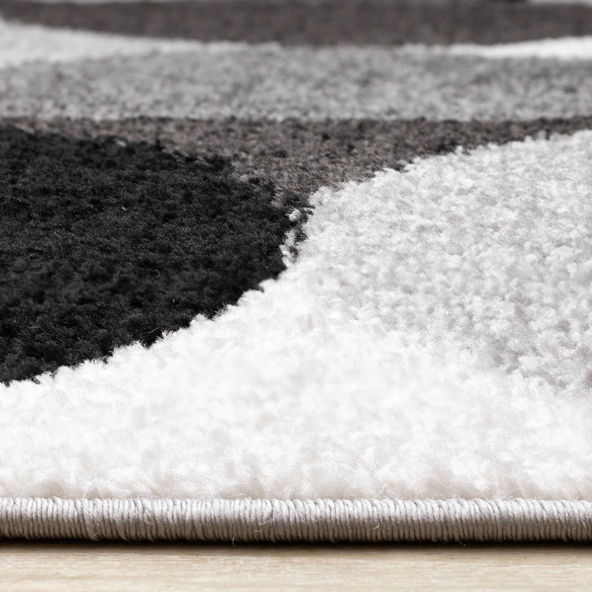 Eclipse 6'7" x 9'6" Mid-Century Modern Design Area Rug - Grey, Black, White
