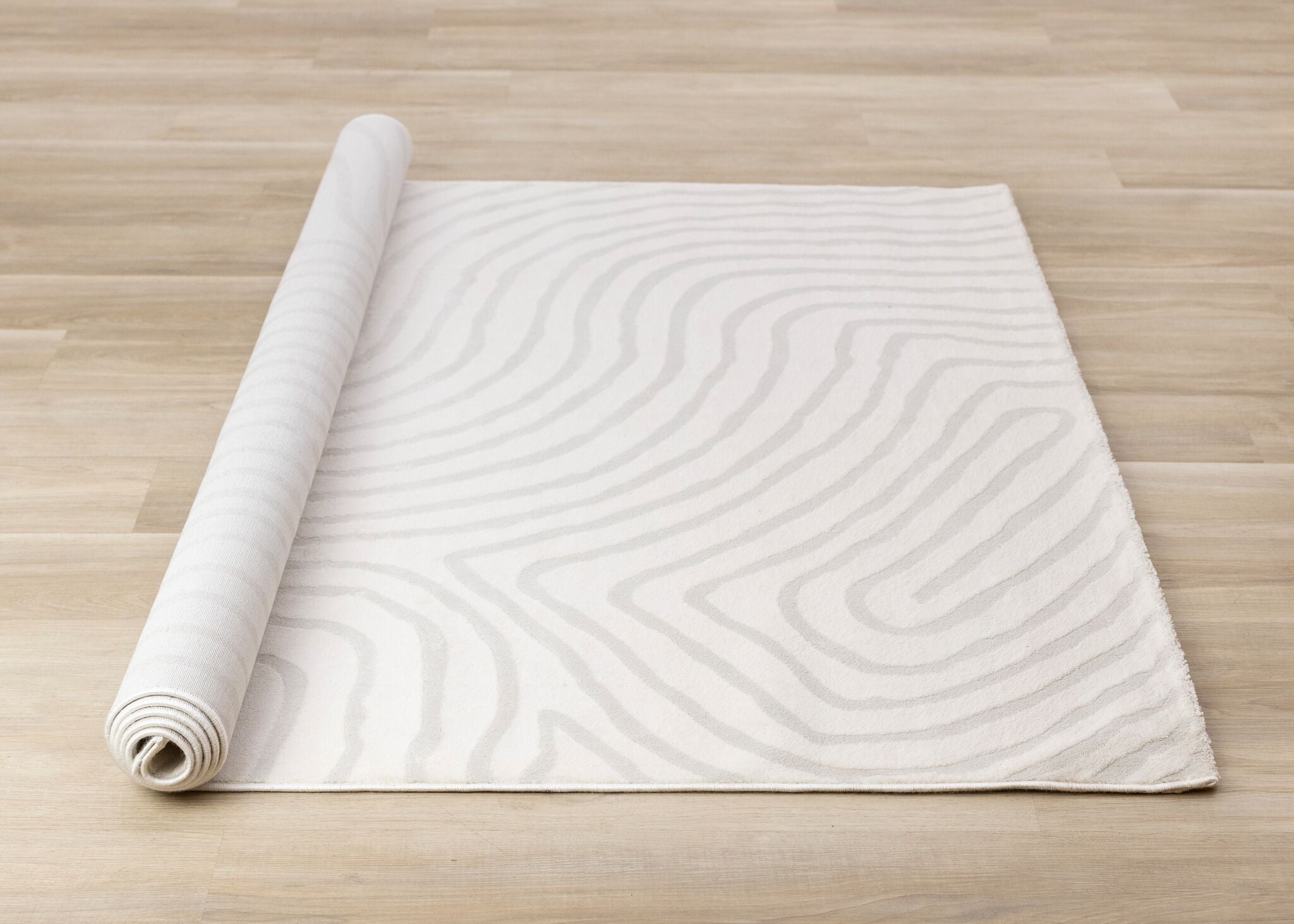 Hayden 6'7" x 9'6" Swirling Lines Area Rug - Grey