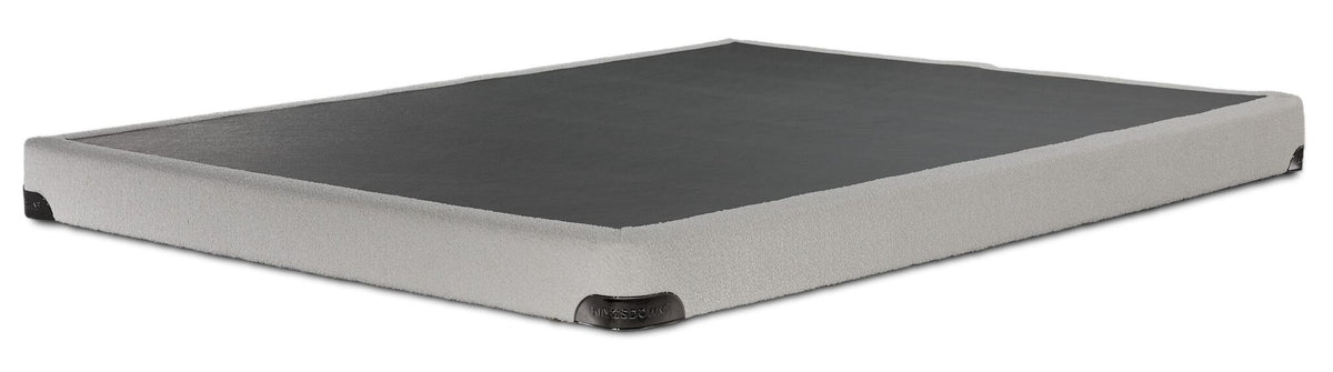 Kingsdown White Boucle queen low-profile boxspring with beige polyester upholstery and black support surface, angled view
