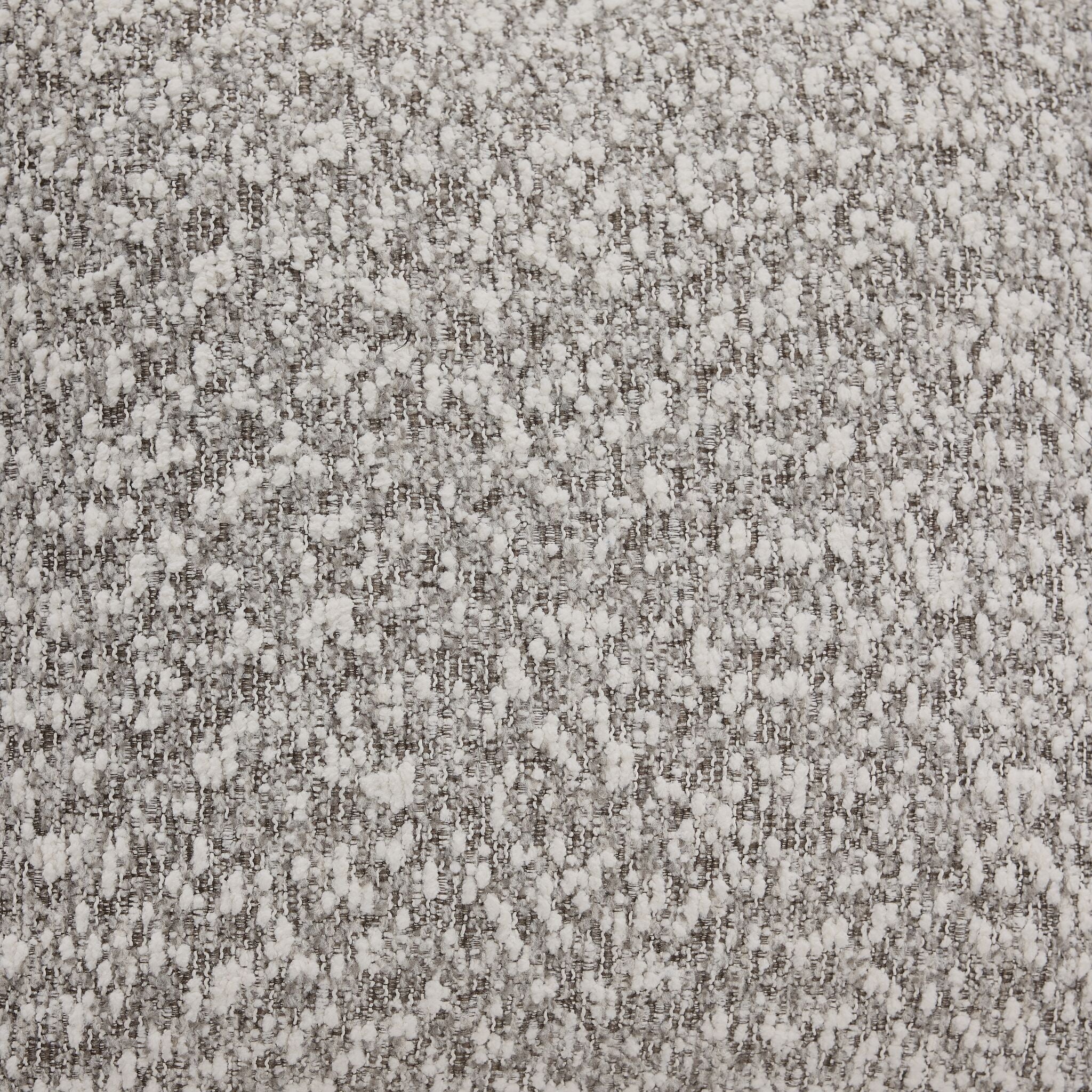 Lucerne close-up showing grey polyester upholstery, cushion edge and seam detail