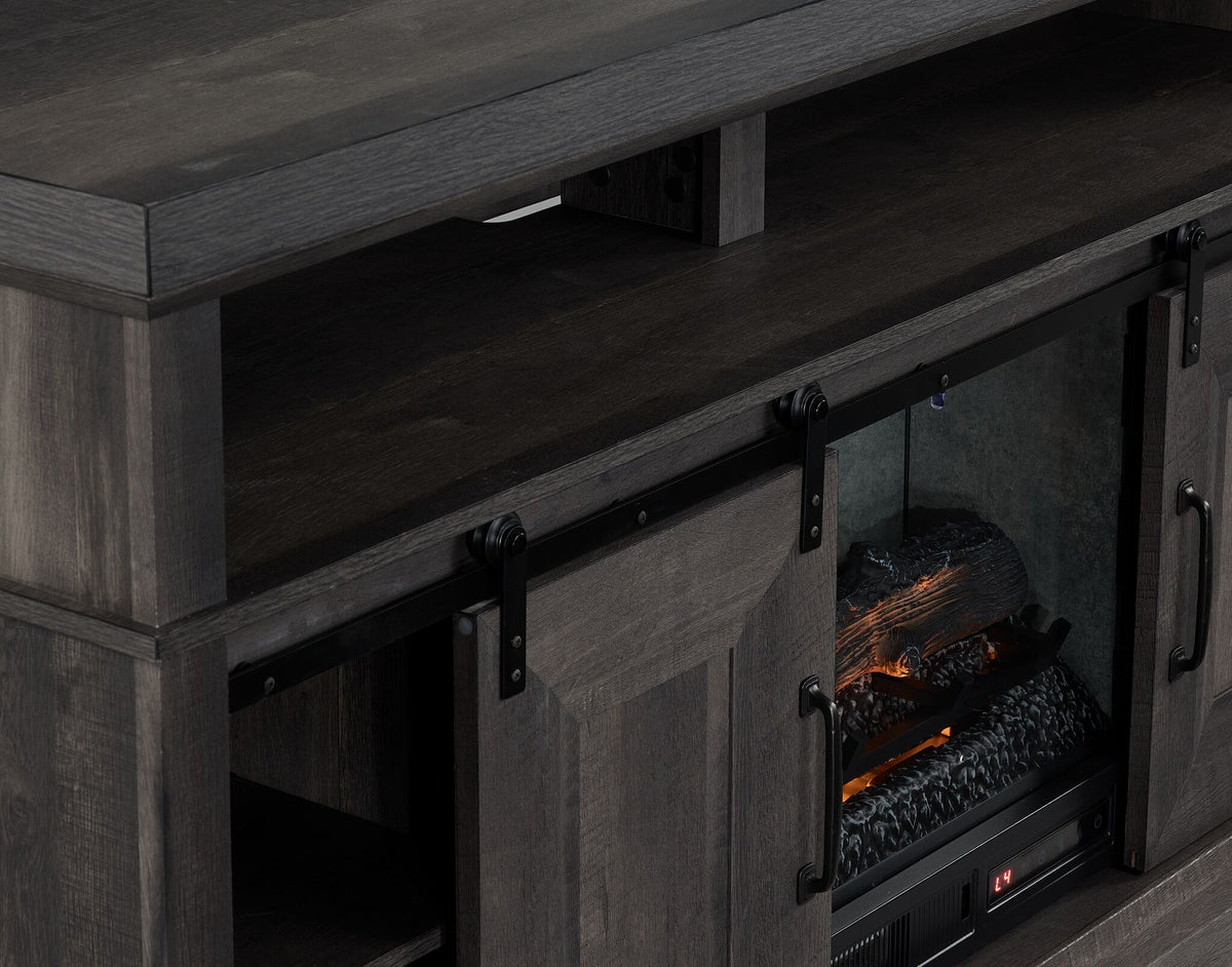 Close-up of Preston charcoal Fireplace TV Stand showing black sliding barn door hardware, open shelf and fireplace insert