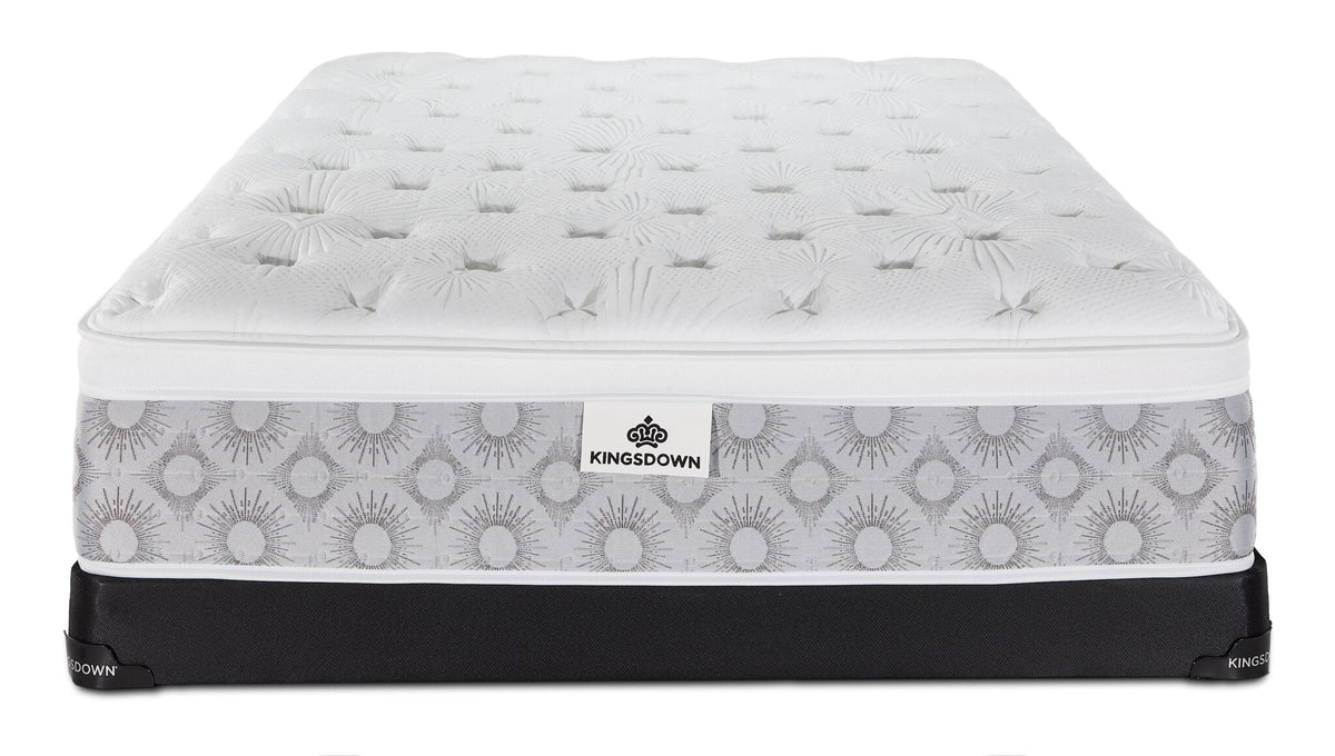 Front view of the Kingsdown Quinlan Plush Euro Top queen mattress and black low-profile boxspring set