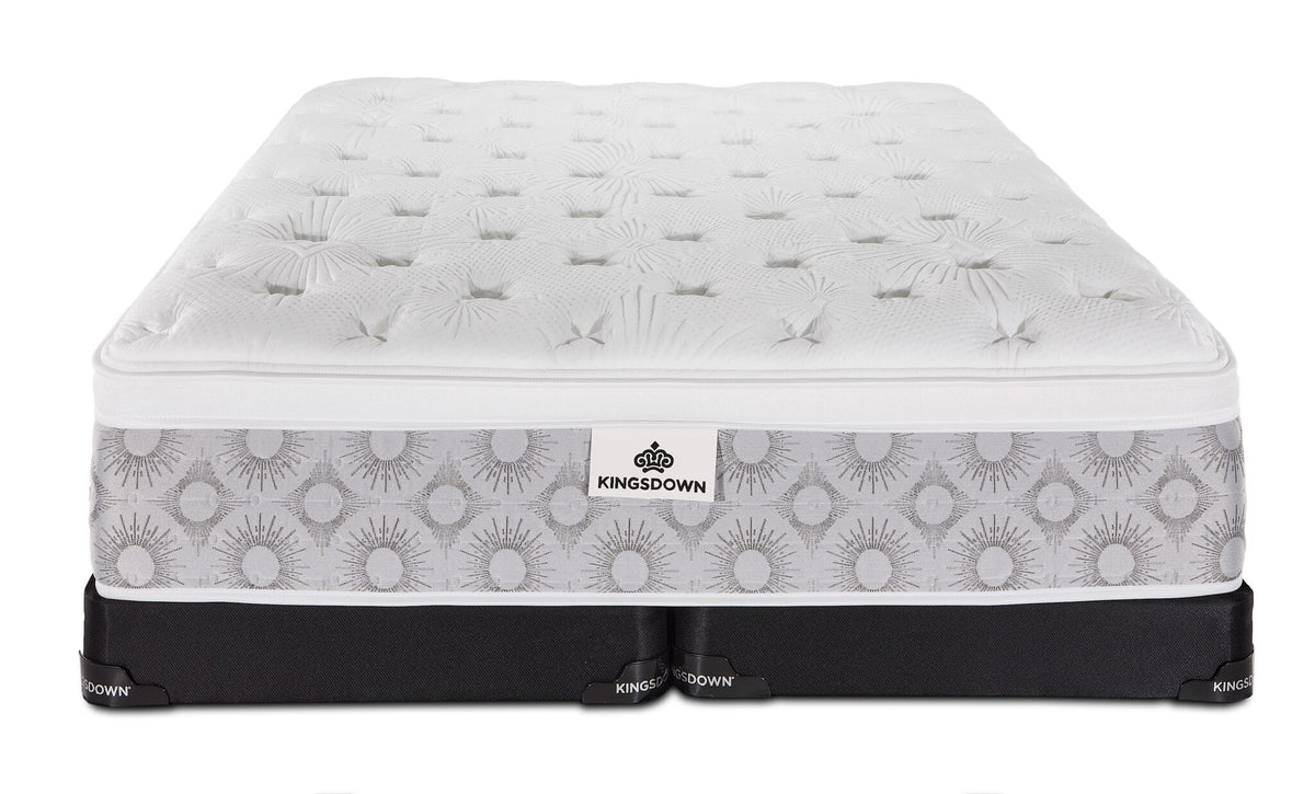 Front view of the Kingsdown Quinlan Plush Euro Top king mattress with two black split low-profile boxsprings
