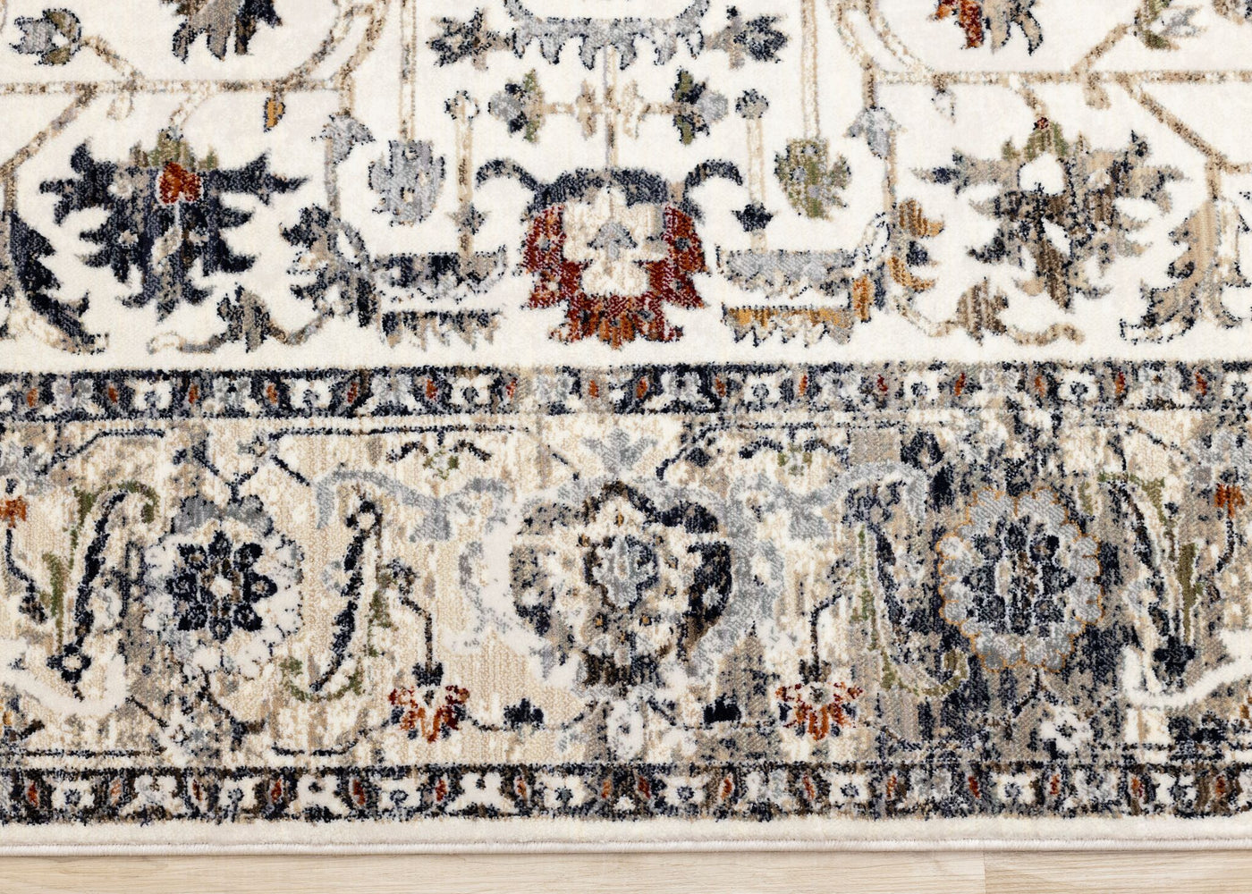Serene 5'3" x 7'7" Intricate Border Area Rug