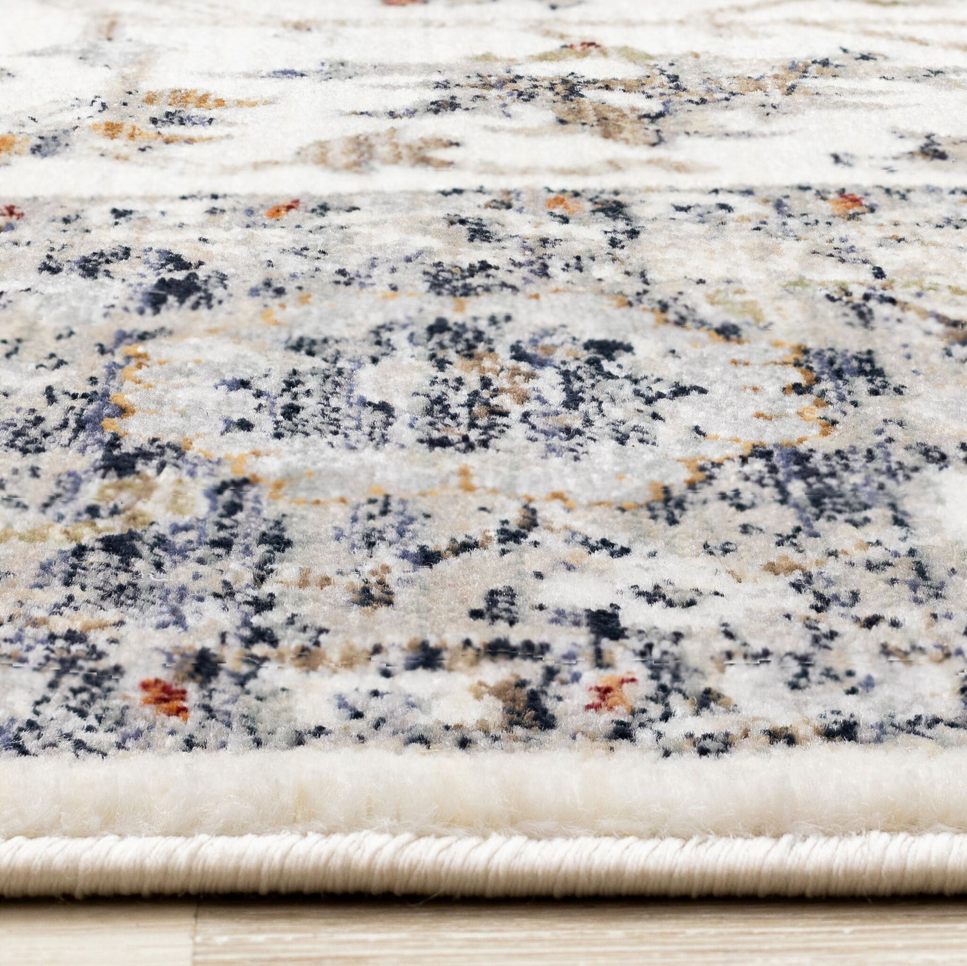 Serene 5'3" x 7'7" Intricate Border Area Rug