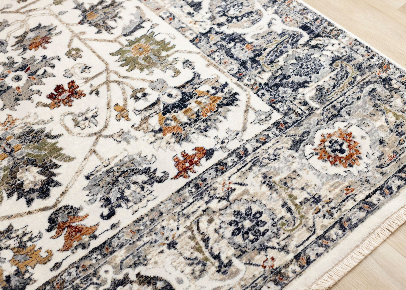 Serene 5'3" x 7'7" Intricate Border Area Rug