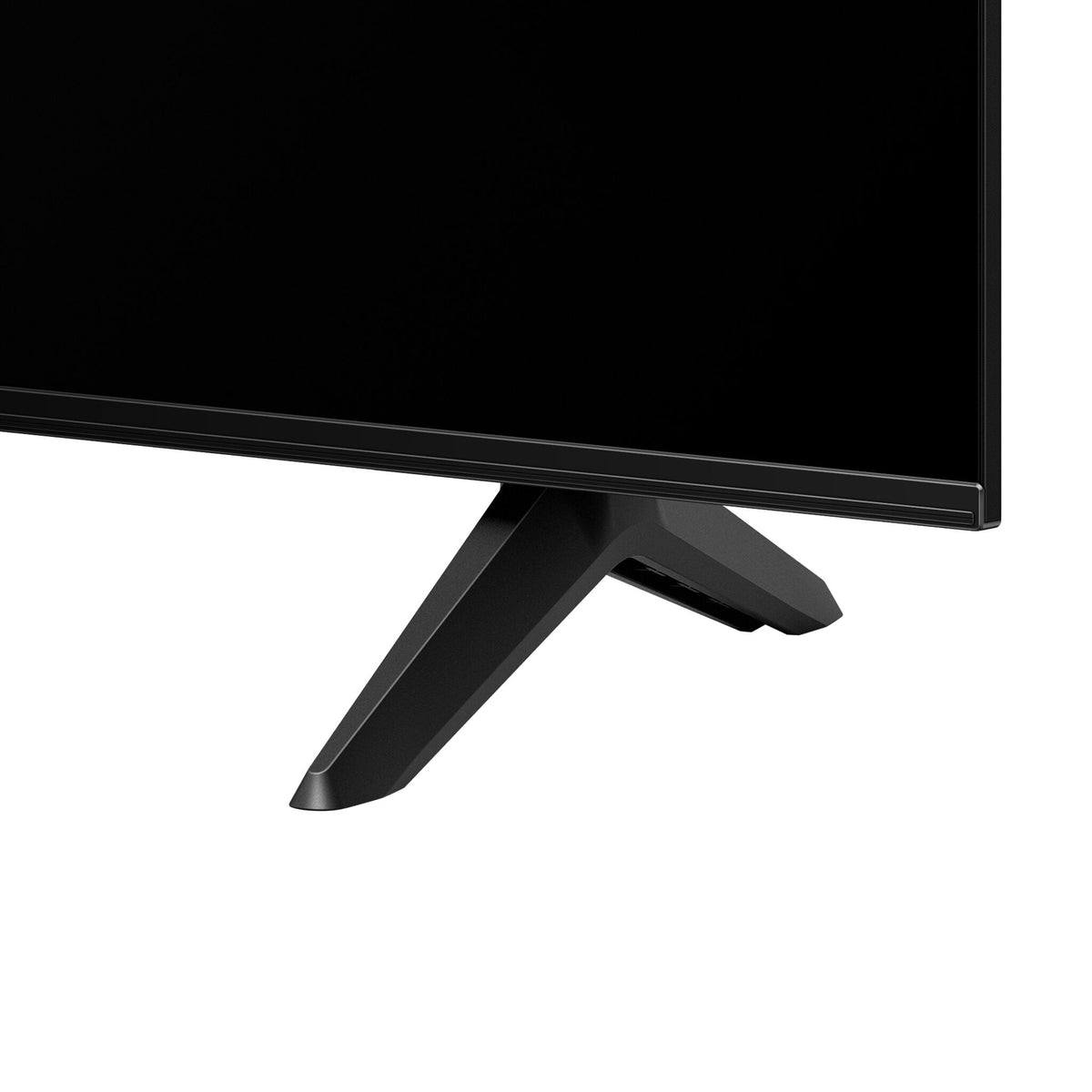Close-up of the black angled TV foot and slim lower screen bezel
