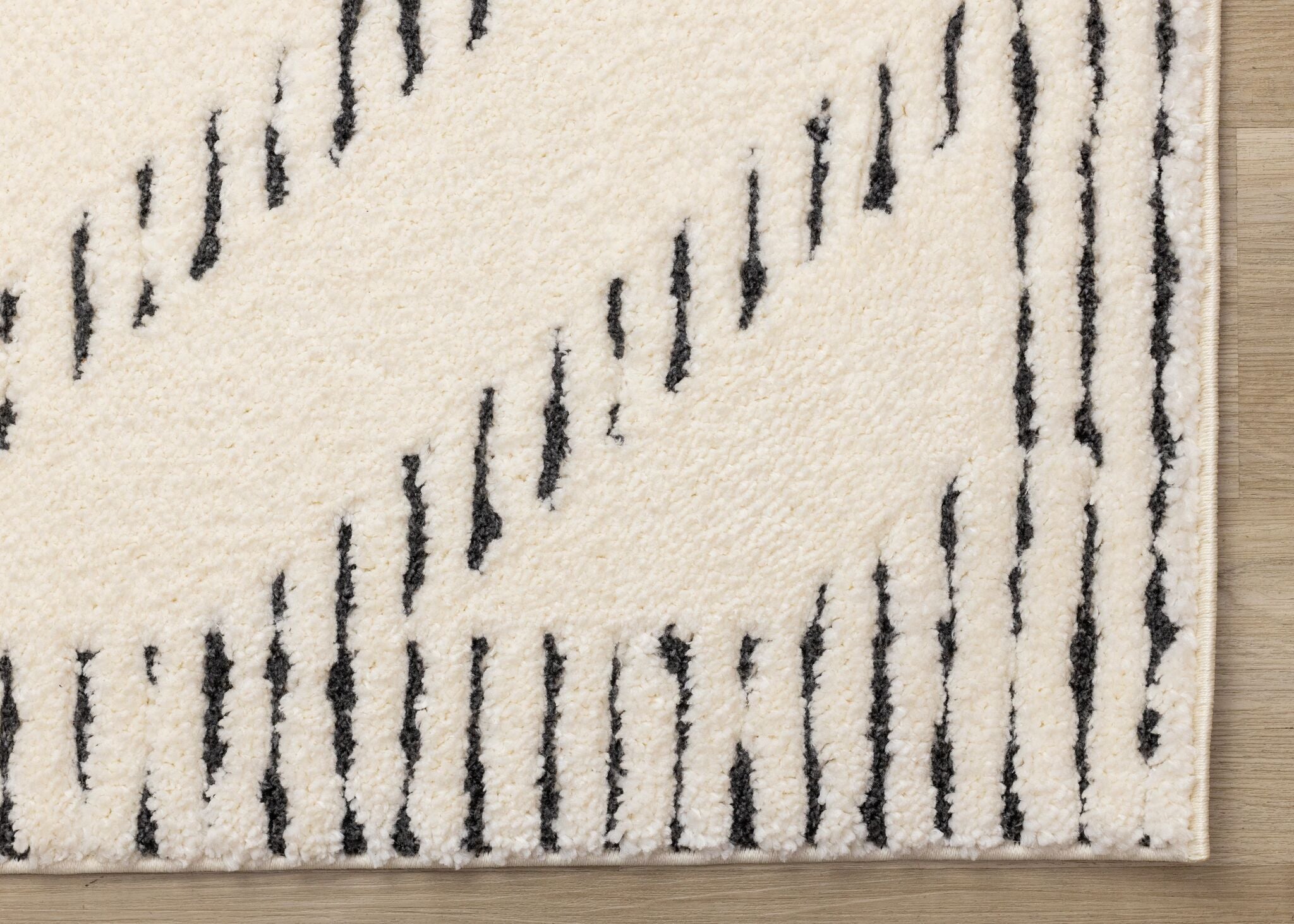 Talia 5'3" x 7'7" Striped Diamond Design Area Rug - Cream, Black