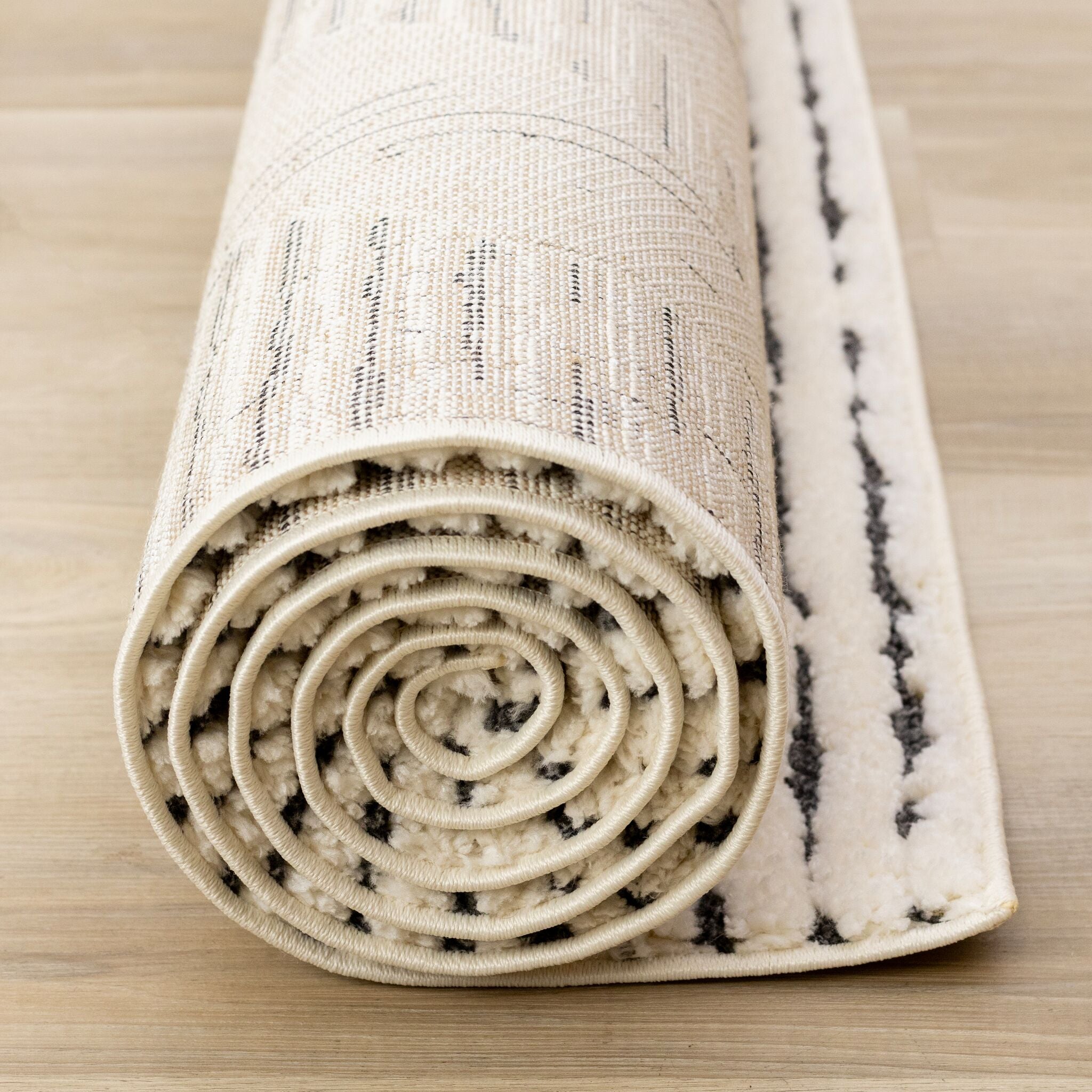 Talia 6'7" x 9'6" Striped Diamond Design Area Rug - Cream, Black