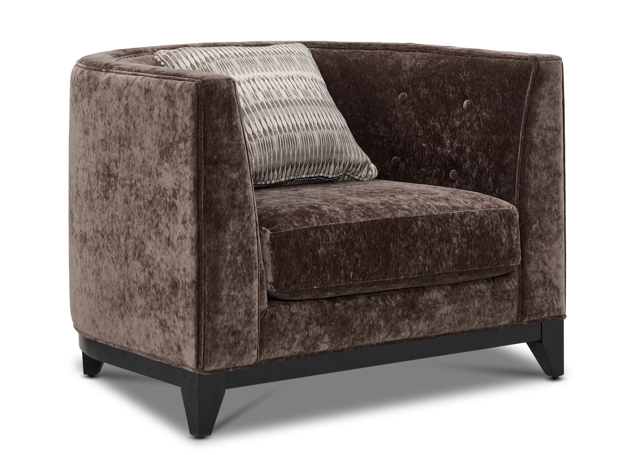Tresor dark brown chair with curved back, button-tufted detail, accent pillow and angled front view