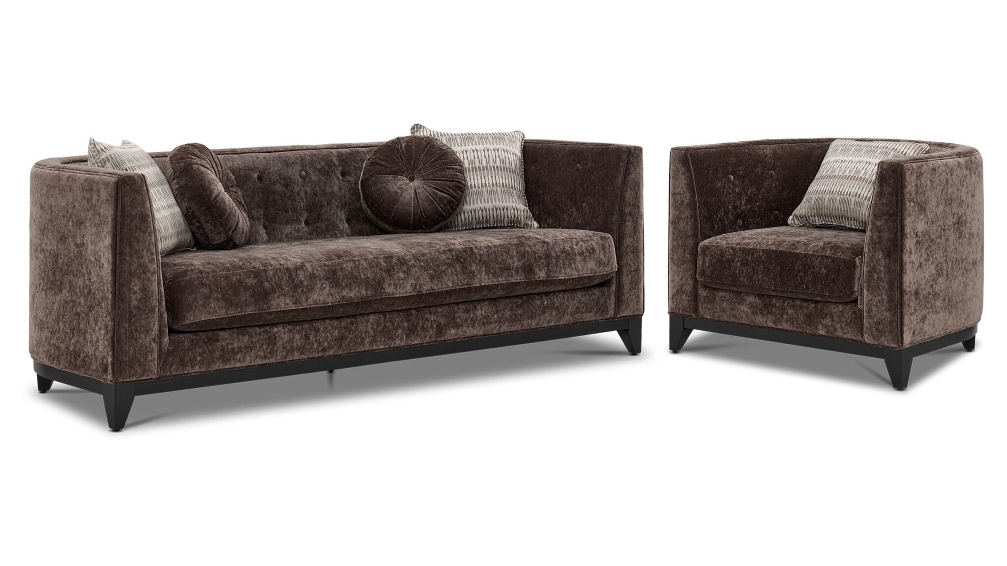Tresor dark brown sofa and chair set with curved backs, button-tufted detail and accent pillows