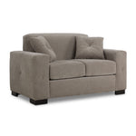 Valetta Loveseat - Wheat angled view with wide track arms, two seat cushions, dark block feet and two accent pillows