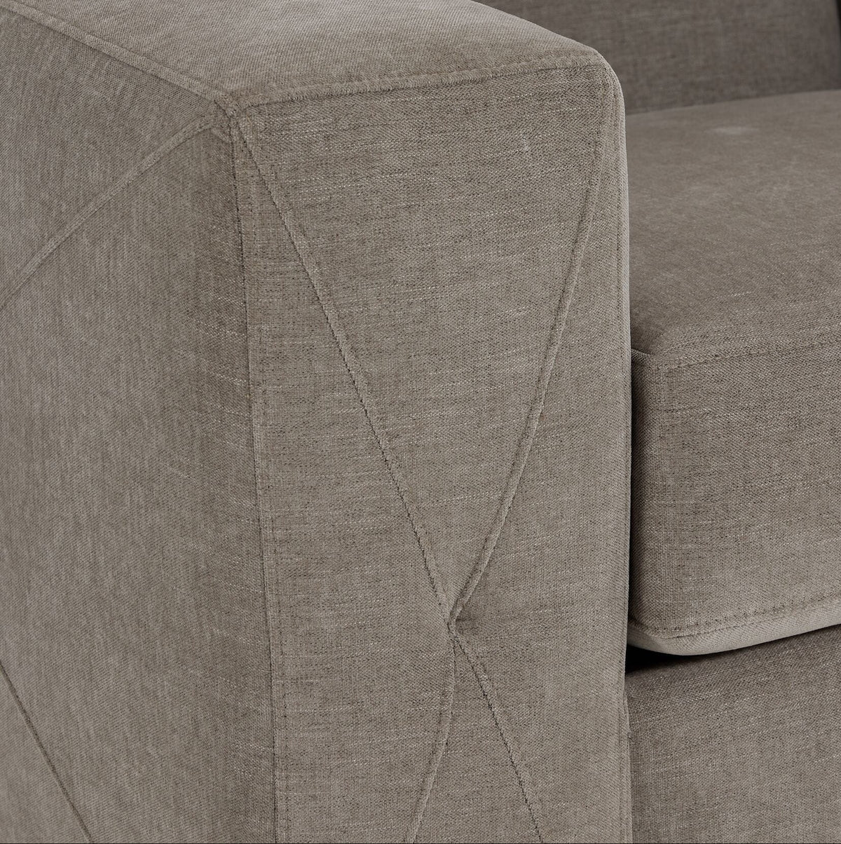 Valetta Loveseat - Wheat close-up showing textured upholstery and decorative cross stitching on the wide track arm