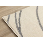Sully 6'7" x 9'6" Circle Swirl Area Rug - Cream