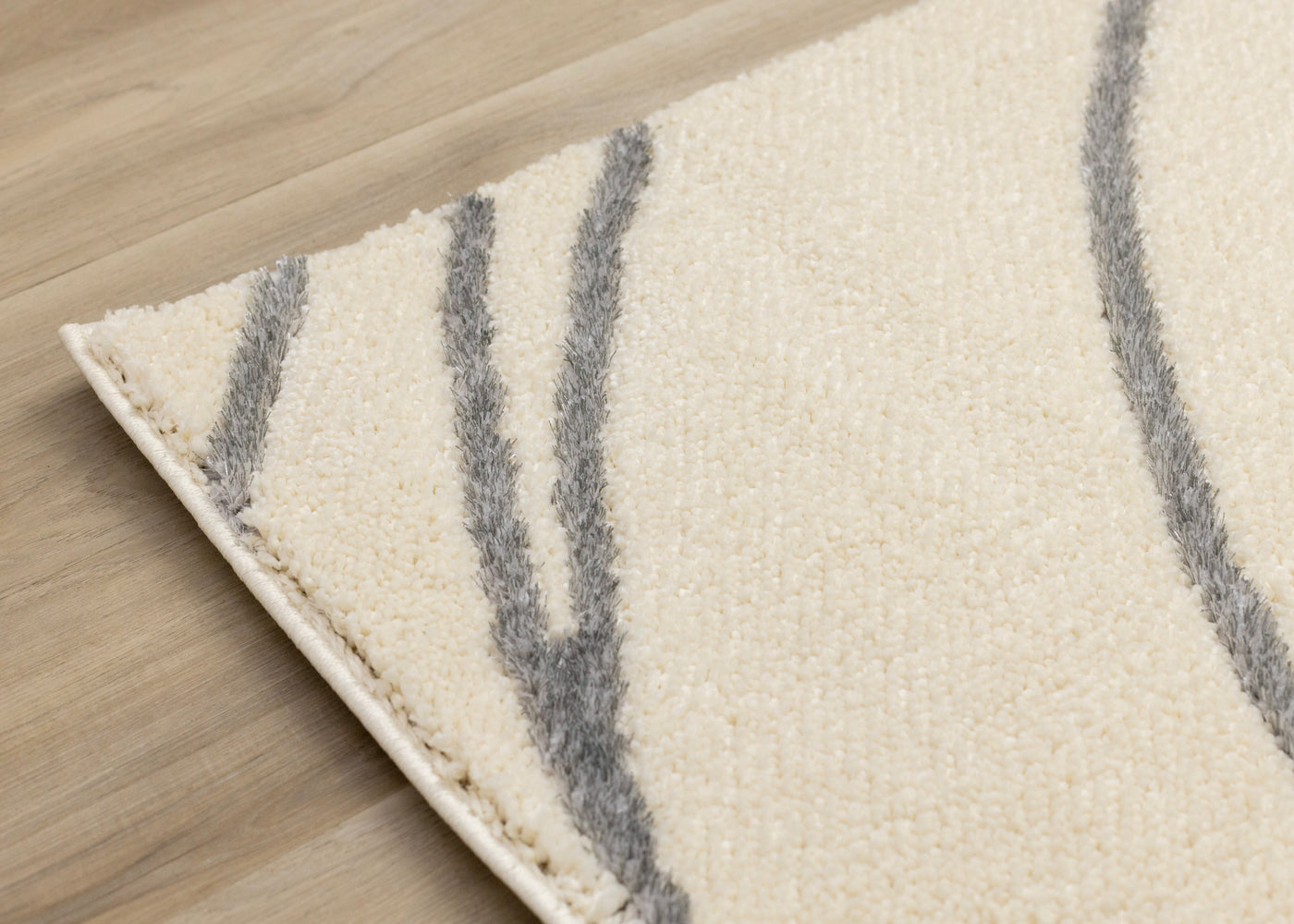 Sully 6'7" x 9'6" Circle Swirl Area Rug - Cream