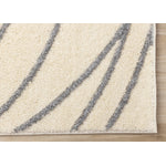 Sully 6'7" x 9'6" Circle Swirl Area Rug - Cream