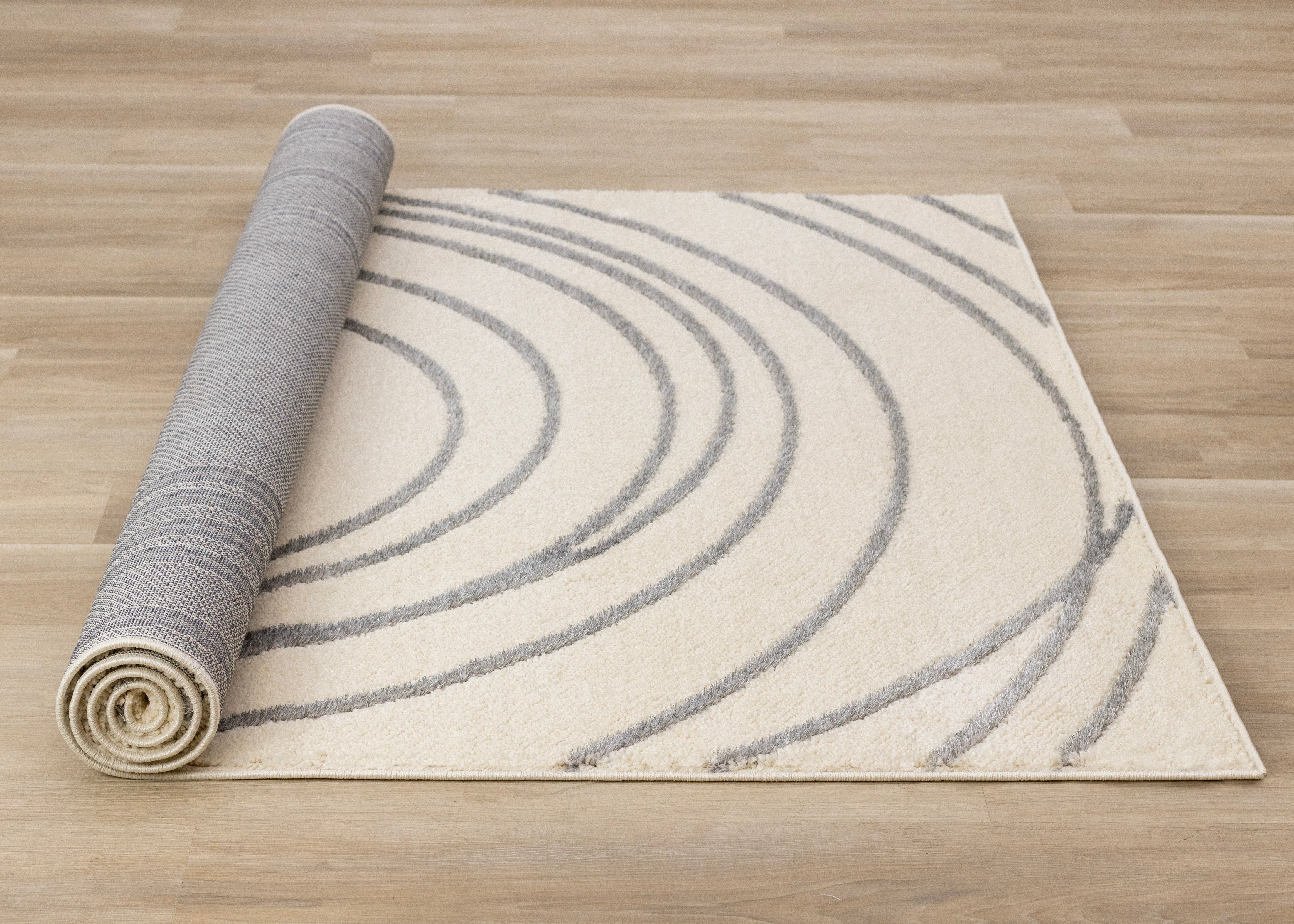 Sully 6'7" x 9'6" Circle Swirl Area Rug - Cream