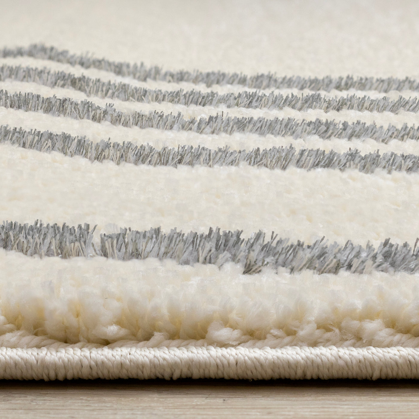 Sully 5'3" x 7'7" Circle Swirl Area Rug - Cream
