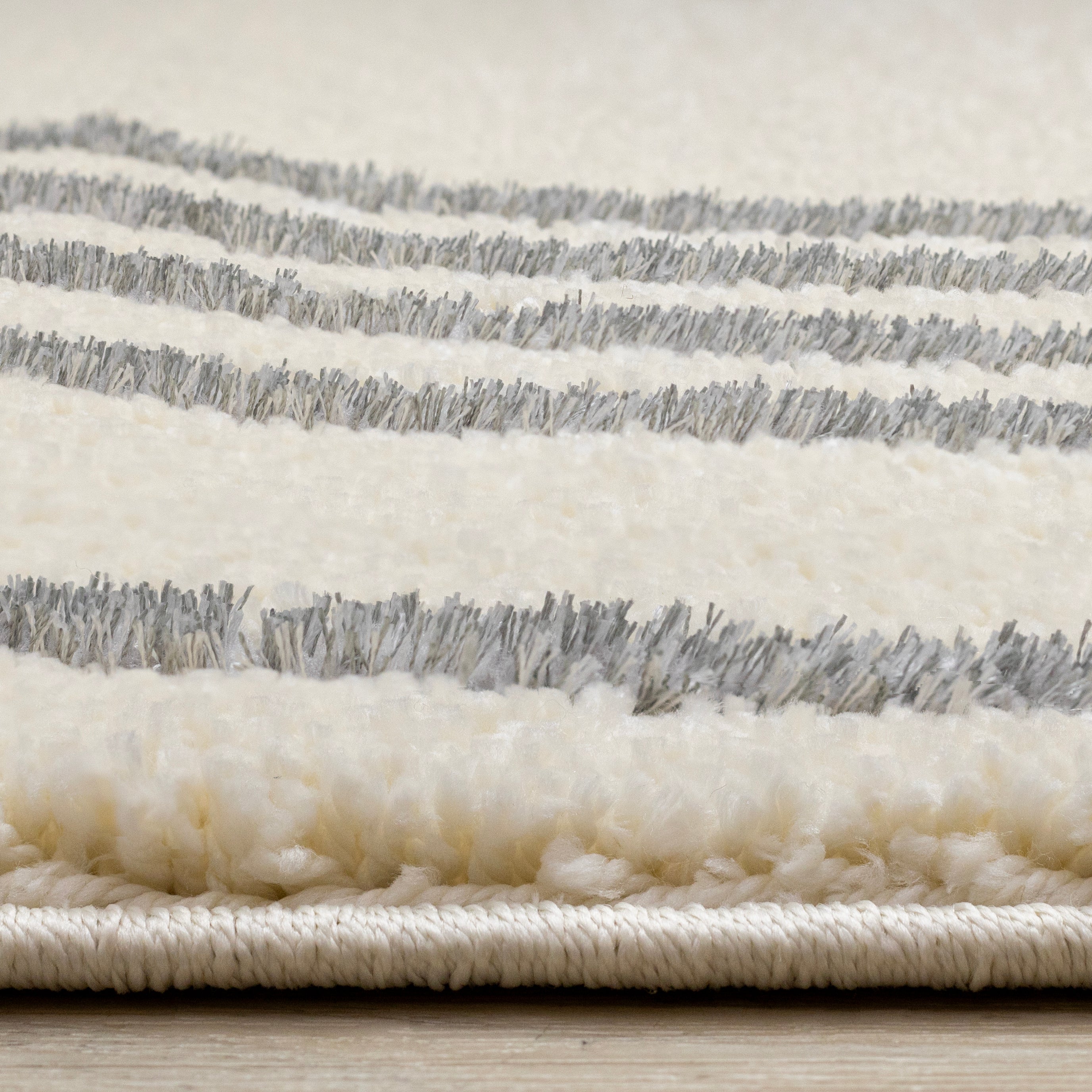 Sully 6'7" x 9'6" Circle Swirl Area Rug - Cream