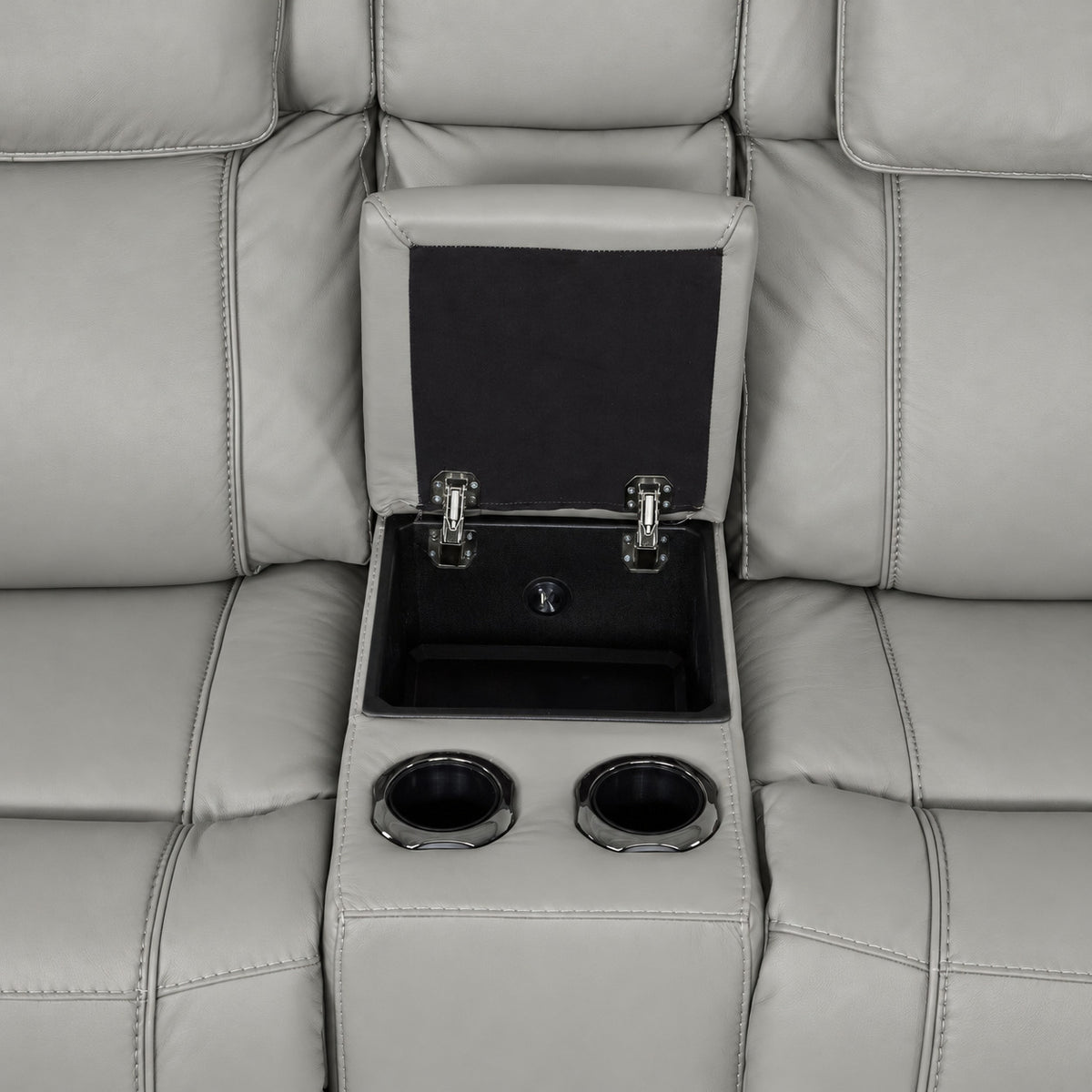Velocity straight console close-up showing open storage compartment and two built-in cupholders
