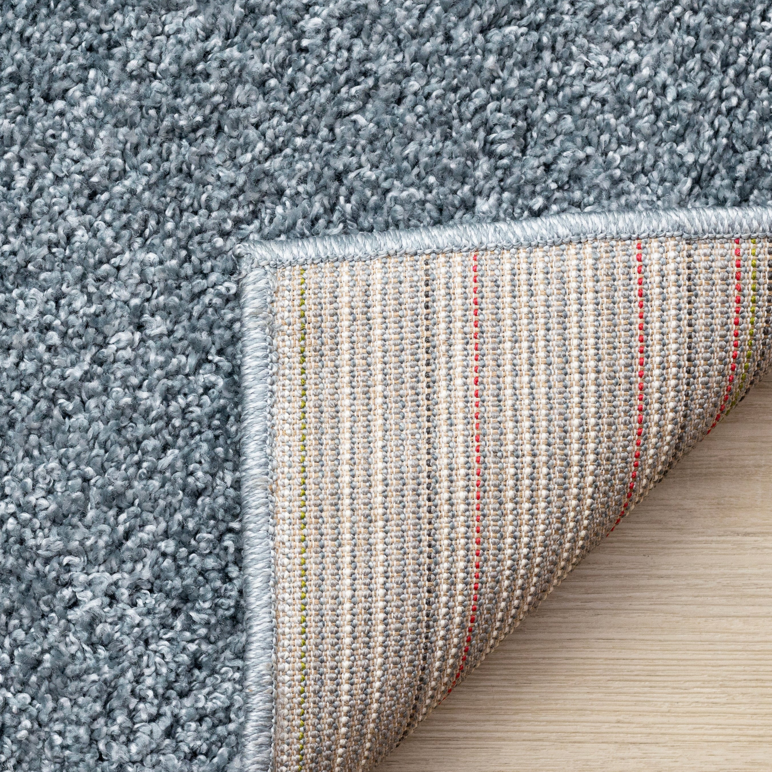 Brio 6'7" x 9'10" Shag Area Rug - Blue