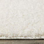 Brio 5'3" x 7'7" Shag Area Rug - Cream