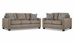 City Leather Sofa and Loveseat Set - Stone with matching leather seating, patterned accent pillows and dark wood legs