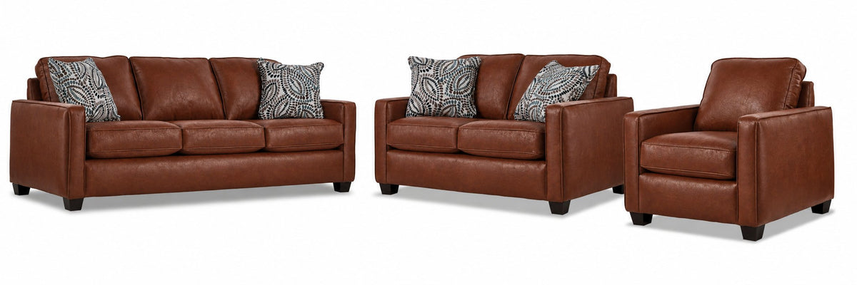 City Leather Sofa, Loveseat and Chair Set - Brown with matching leather seating, patterned accent pillows and dark wood legs