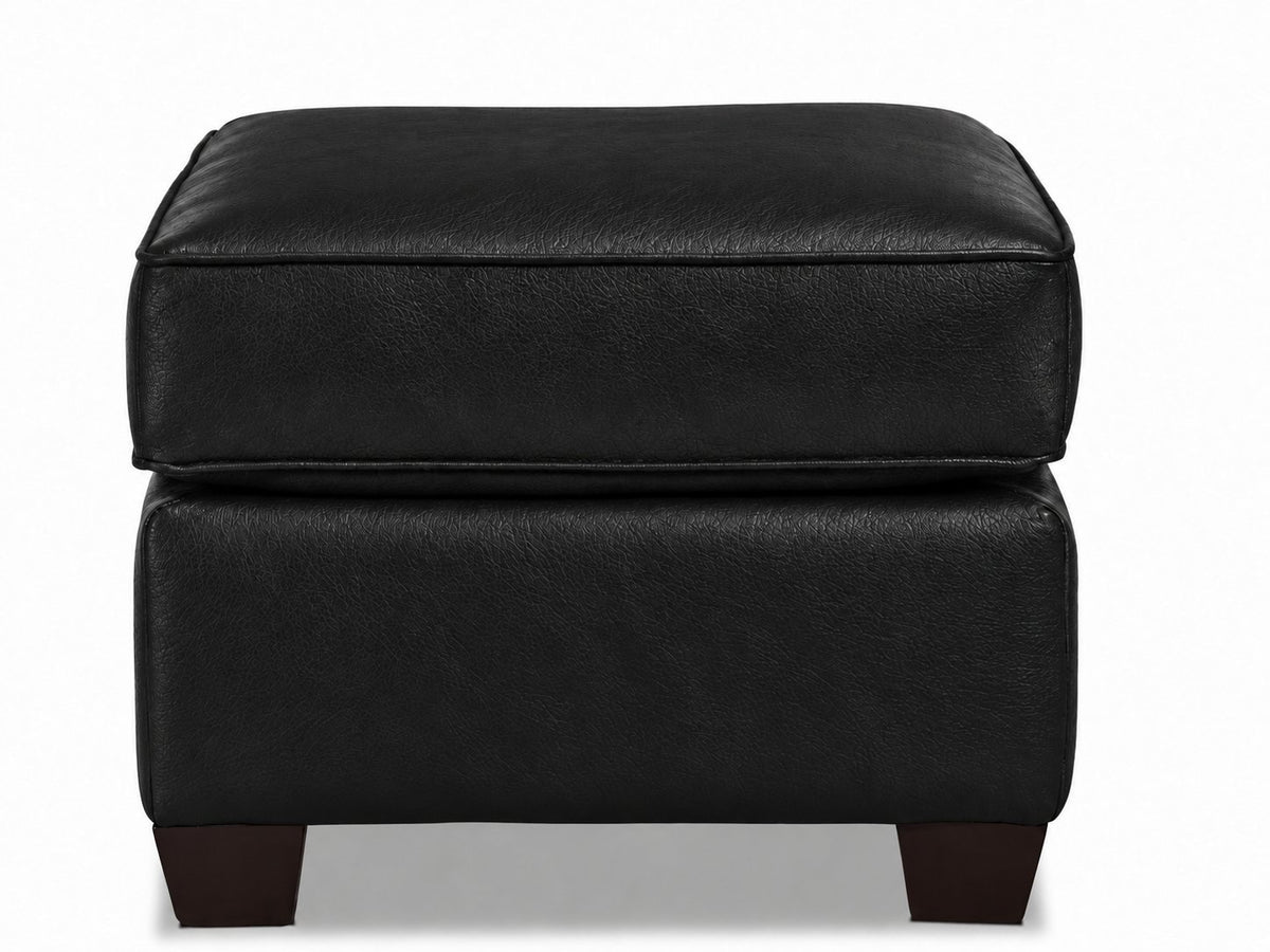 City Leather Ottoman - Black front view with a padded leather cushion, piped edges and dark wood legs