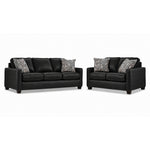 City Leather Sofa and Loveseat Set - Black with matching leather seating, patterned accent pillows and dark wood legs