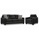 City Leather Sofa and Chair Set - Black with matching leather seating, patterned accent pillows and dark wood legs