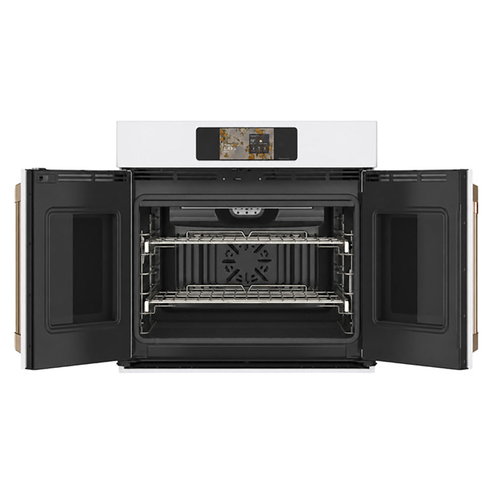 CAFÉ™ Professional Series 30" Matte White French-Door Wall Oven open showing convection fan and two racks