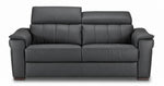 Dark grey leather sofa with one headrest raised and the other lowered to show adjustable positioning