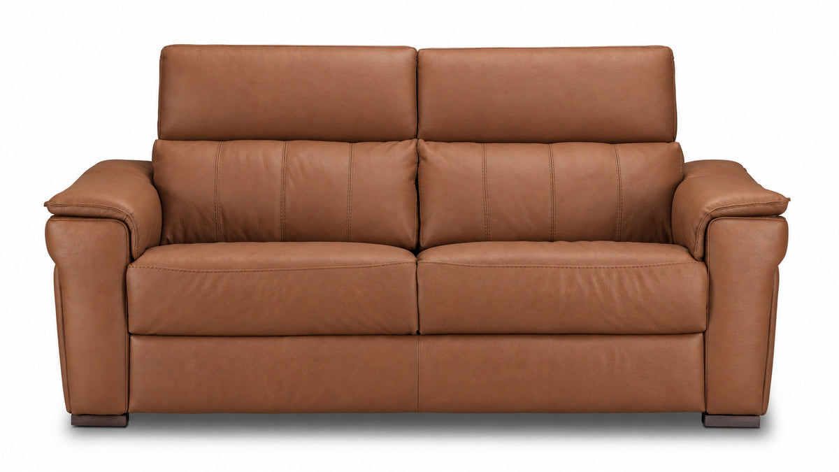 Front view of the cognac leather sofa with deep seats, stitched back cushions and padded arms