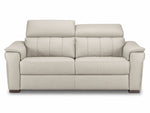 Cream leather sofa with one headrest raised and the other lowered
