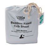 Little Leon’s Bamboo Fitted Crib Sheet in blue drawstring packaging with 100% bamboo and 250 thread count details
