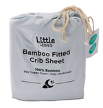 Little Leon’s Bamboo Fitted Crib Sheet in blue drawstring packaging with 100% bamboo and 250 thread count details