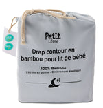 Petit Léon blue bamboo fitted crib sheet in drawstring packaging with 100% bamboo and 250 thread count details