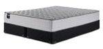 Sealy Burchelle Extra Firm Tight Top King mattress and black split boxspring set, three-quarter view