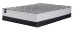 Sealy Burchelle Extra Firm Tight Top Queen mattress with black low profile boxspring, three-quarter view